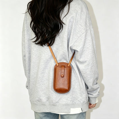 Handmade leather phone bag with shoulder strap