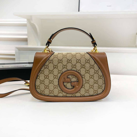 Luxury Vintage Monogram Canvas Curved Saddle Bag