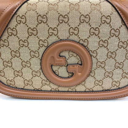 Luxury Vintage Monogram Canvas Curved Saddle Bag