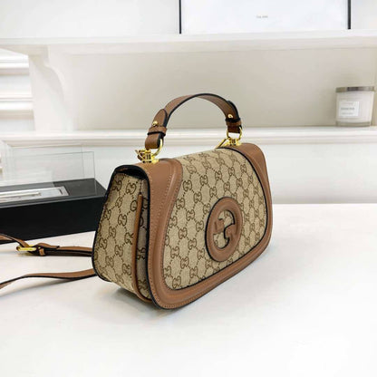 Luxury Vintage Monogram Canvas Curved Saddle Bag