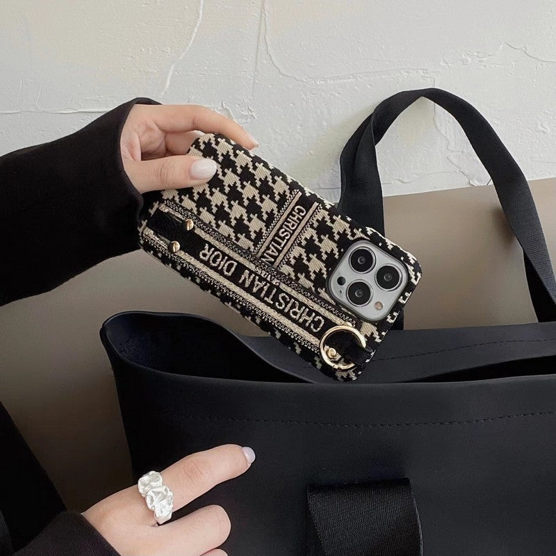 Custodia per iPhone con cinturino alla moda pied de poule