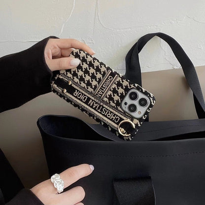 Custodia per iPhone con cinturino alla moda pied de poule