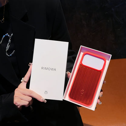 Custodia per iPhone con armatura metallica a coste: protezione elegante ispirata al viaggio