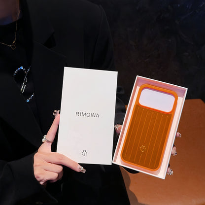 Custodia per iPhone con armatura metallica a coste: protezione elegante ispirata al viaggio