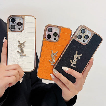 حافظة iPhone من الجلد بلون ذهبي وردي