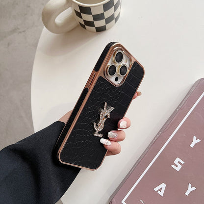 حافظة iPhone من الجلد بلون ذهبي وردي