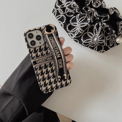 Custodia per iPhone con cinturino alla moda pied de poule